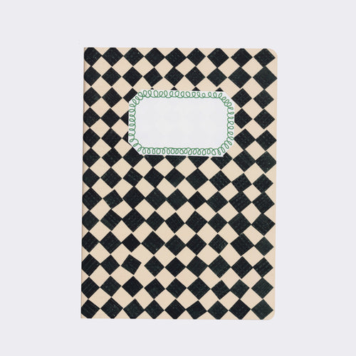 A black and white checkered sketchbook with a clear label window on the cover.