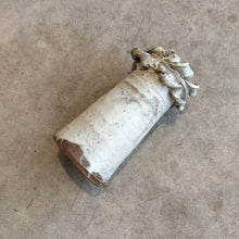 Load image into Gallery viewer, ruffled ceramic vase on a concrete surface
