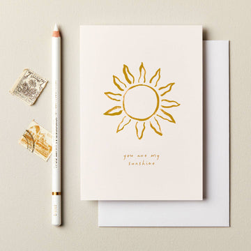 a card with. a sun on it 