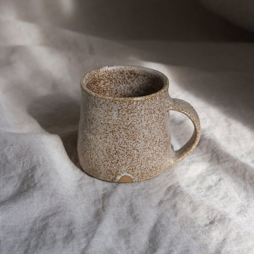 white mug vessel coffee cup speckled