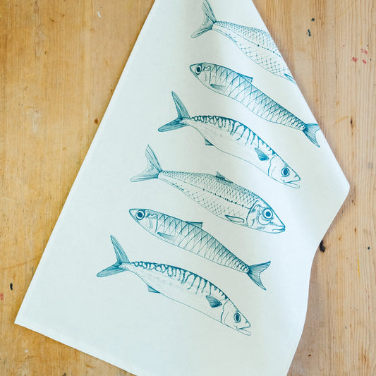 Lottie Day Fish Illustrated Tea Towel On A Wooden Background