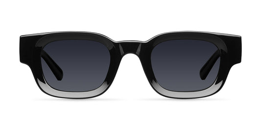 Black sunglasses with dark lenses on a white background
