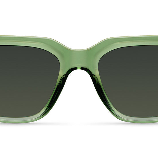 green sunglasses on a white backgorund 