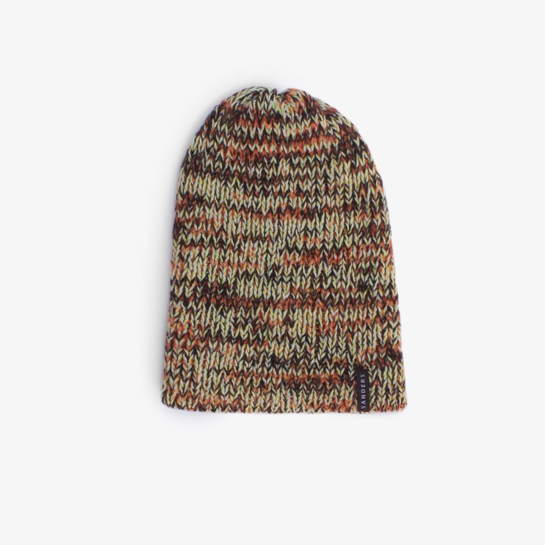 A knitted beanie in warm colours on a white background