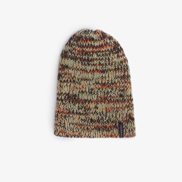 A knitted beanie in warm colours on a white background
