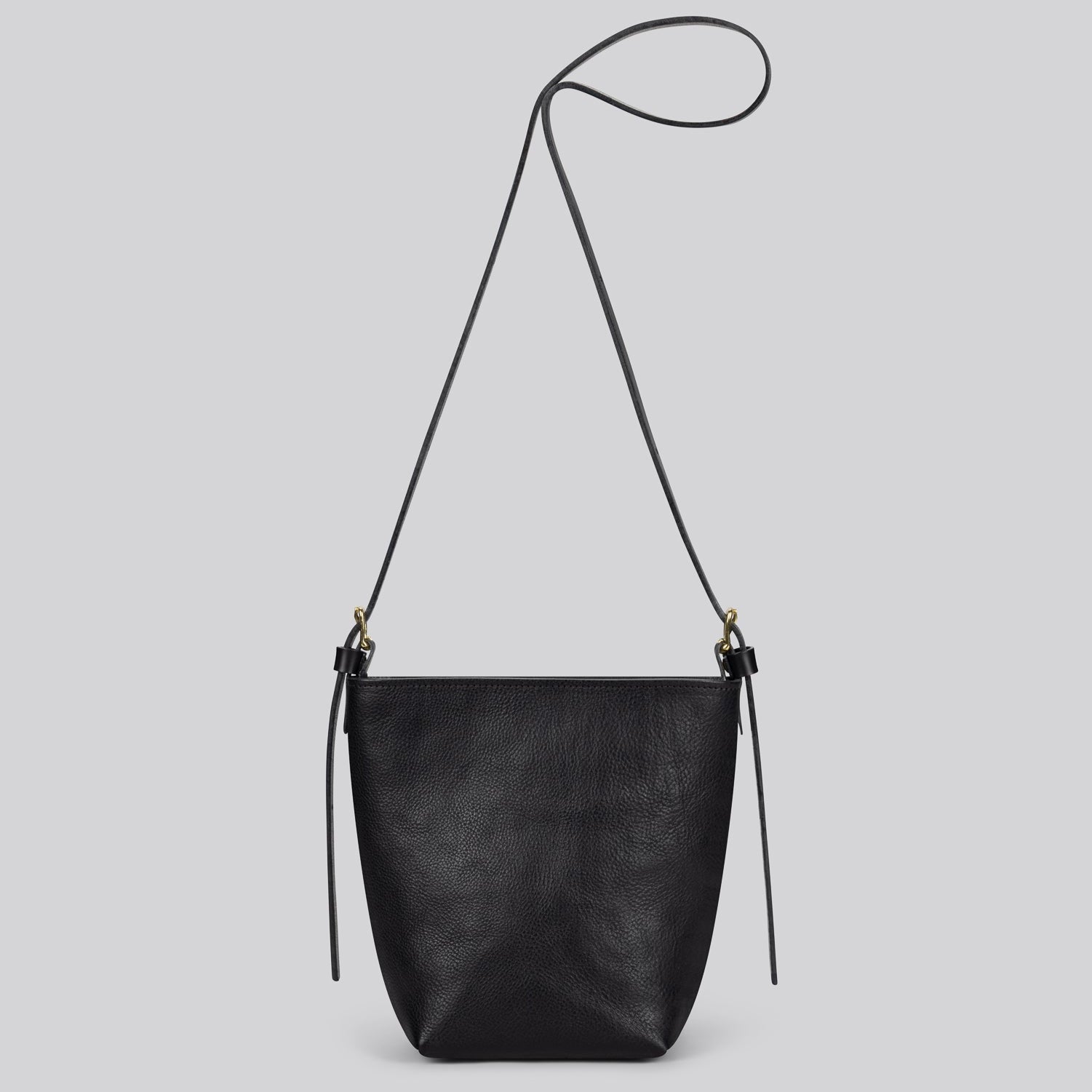 Black handbag on a white background