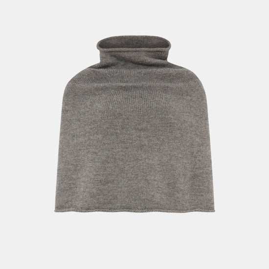 A grey poncho on a white background 