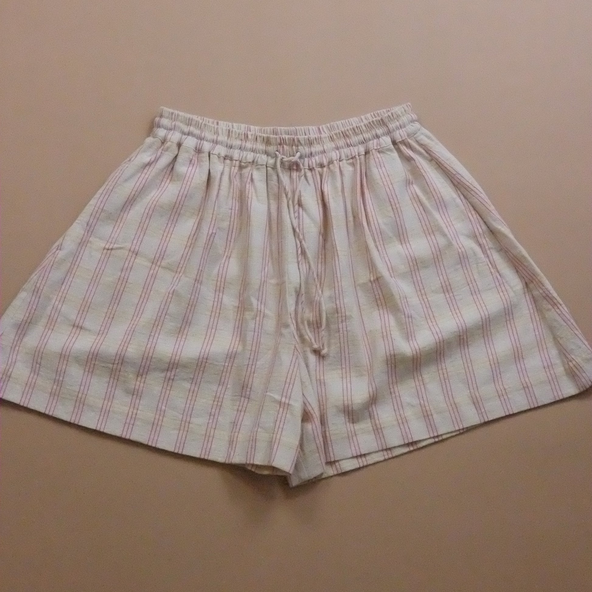Checkered shorts on a beige background