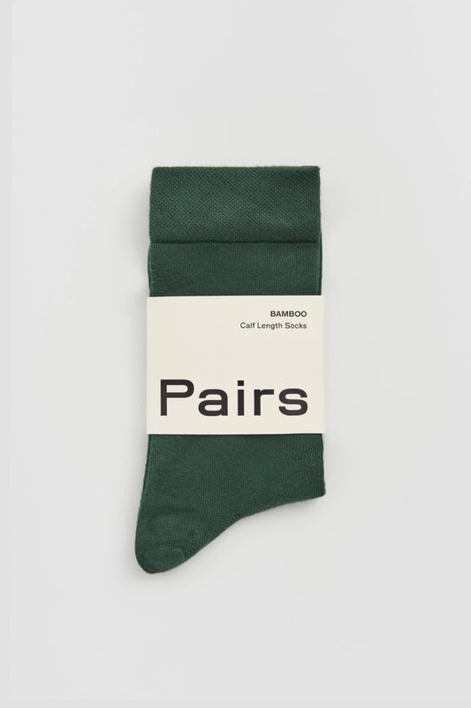 Green sock with 'Pairs' branding on a white background