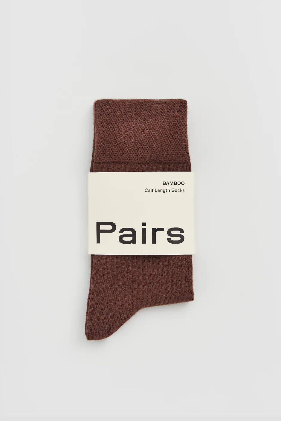 Brown sock with 'Pairs' packaging on a white background