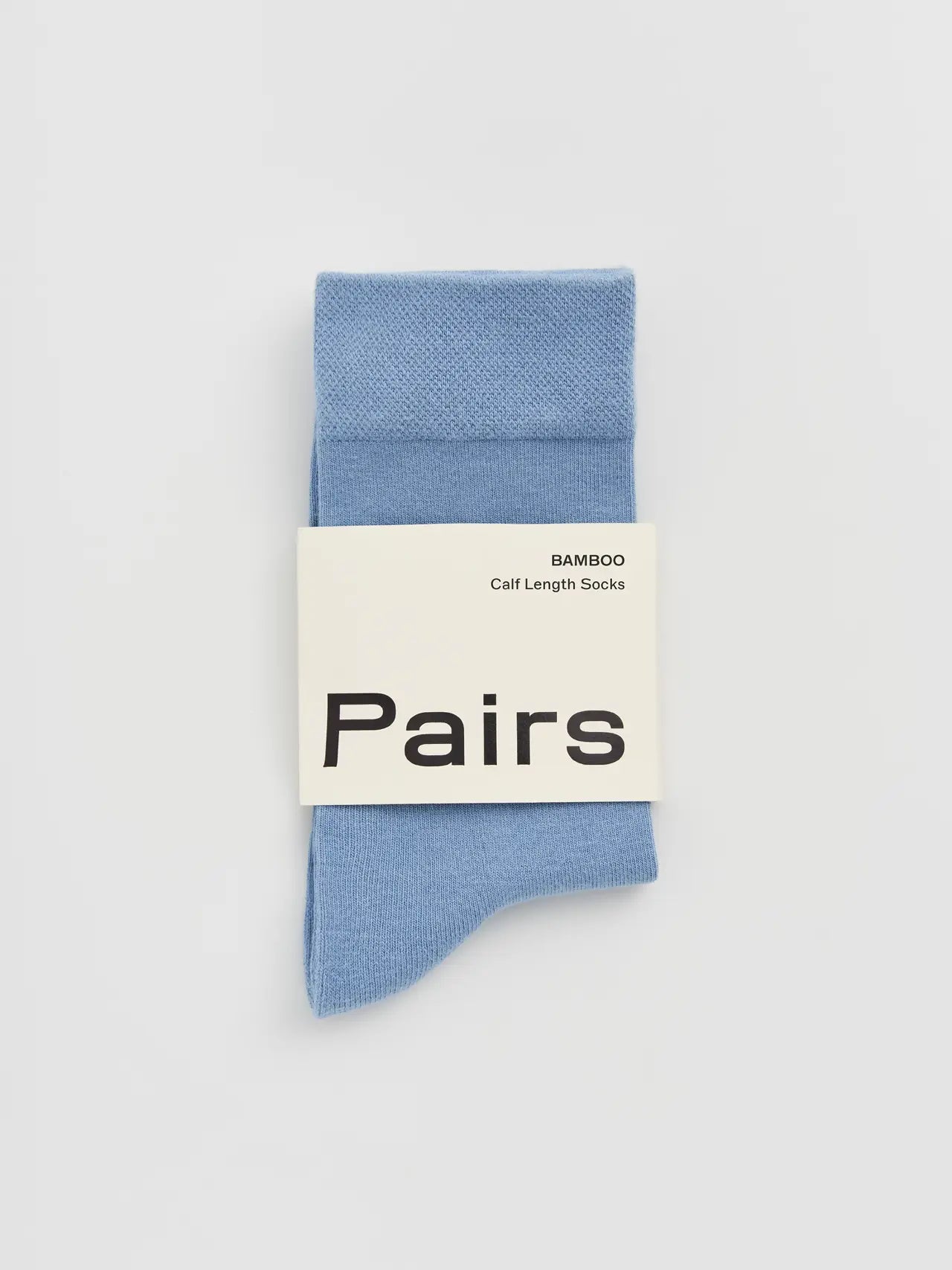 Light blue sock with a 'Pairs' label on a light grey background