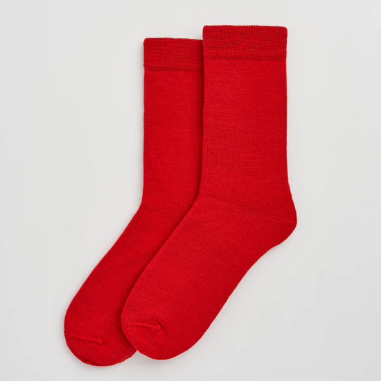 Red socks on a light grey background