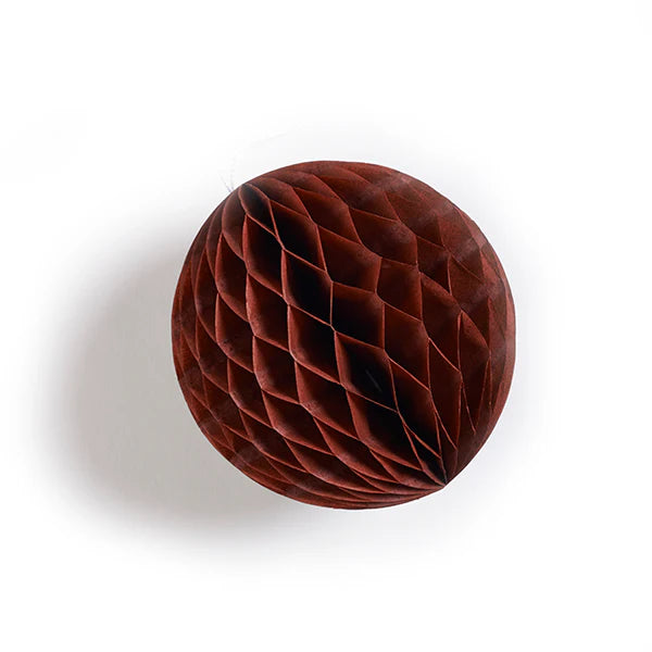 Brown paper honeycomb ball on a white background