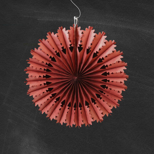 Chestnut paper fan decoration on a black background