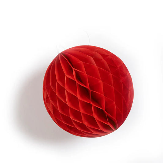 Red paper honeycomb ball on a white background