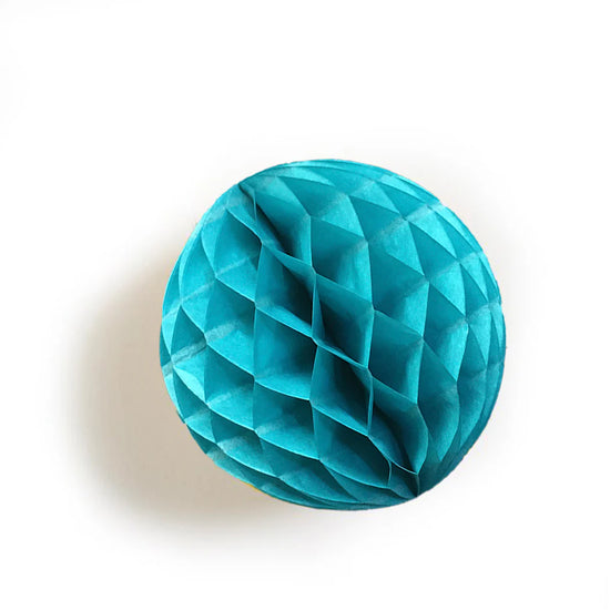 Teal paper  honeycomb ball on a white background