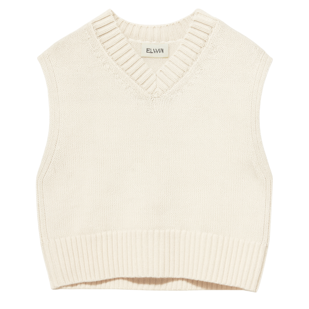 Cream-colored knit vest on a white background