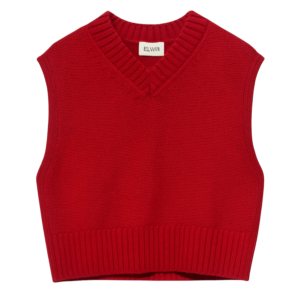 Red knitted vest on a white background