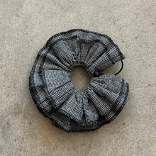Load image into Gallery viewer, Black and white checkered scrunchie on a beige surface

