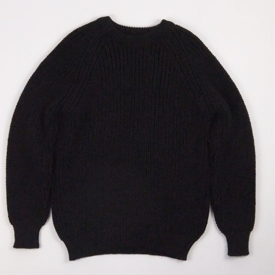Black sweater on a white background