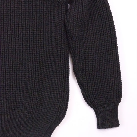 Black sweater on a white background