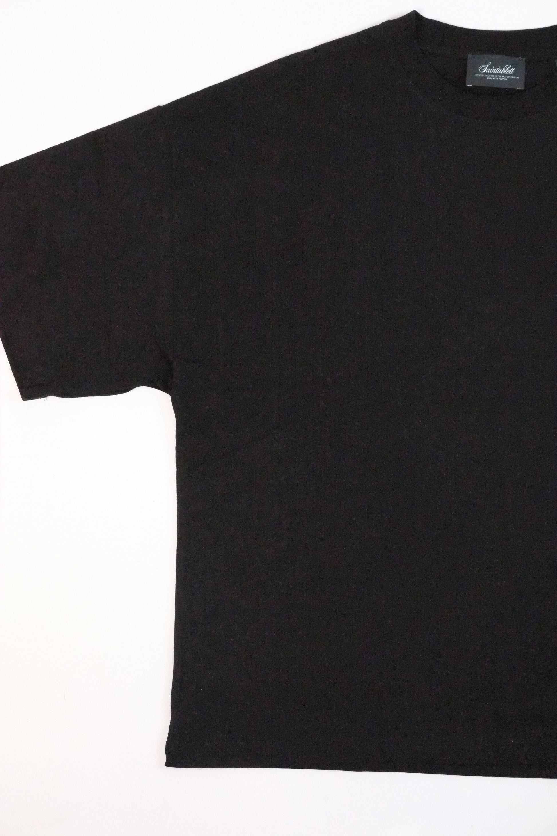 Black t-shirt on a white background