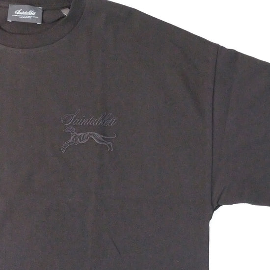 black t-shirt with a logo on a white background