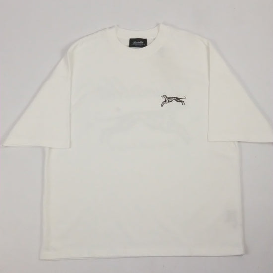 White shirt with a small logo on a light gray background