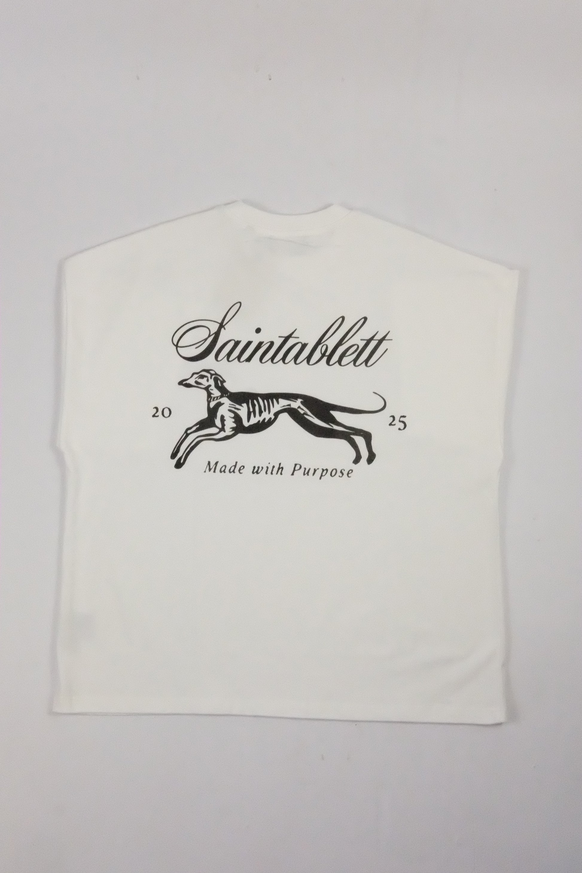 White t shirt black text and zebra design on a white background