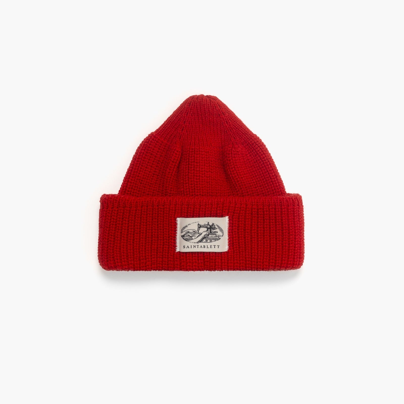 A red beanie on a white background 