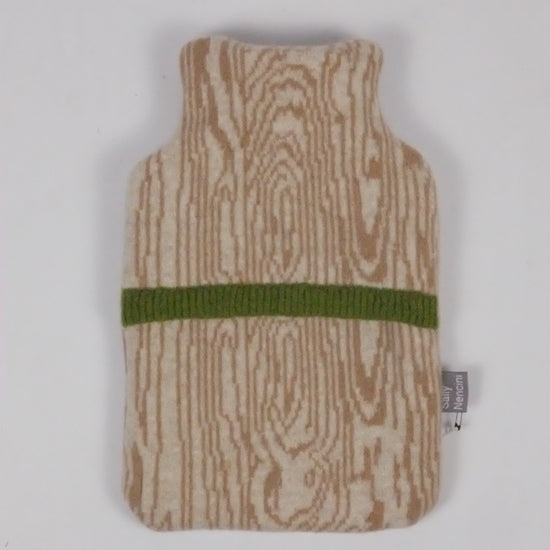 Small pouch with wood grain pattern and green strap on a white background