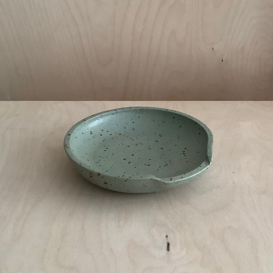 green ceramic spoon rest