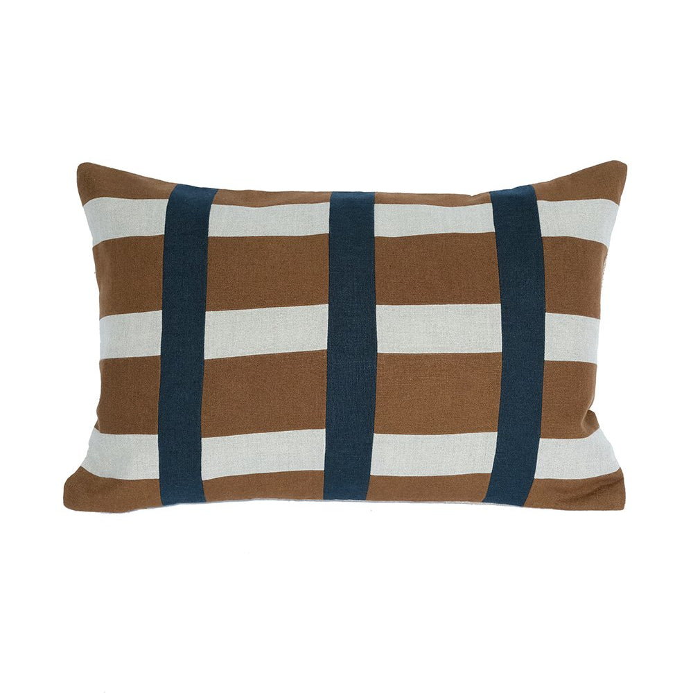Striped pillow with brown, white, and navy pattern on a white background
