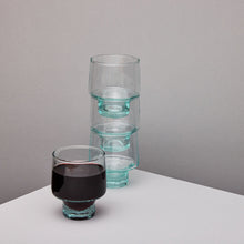 Load image into Gallery viewer, Set of clear glass wine glasses on a grey background
