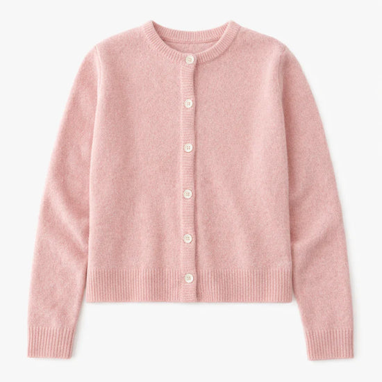 Blush pink lambswool cardigan with cream buttons on a white background