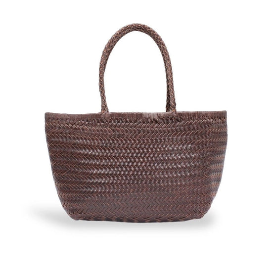 A brown woven straw tote bag with two braided shoulder straps, shown against a plain white background.