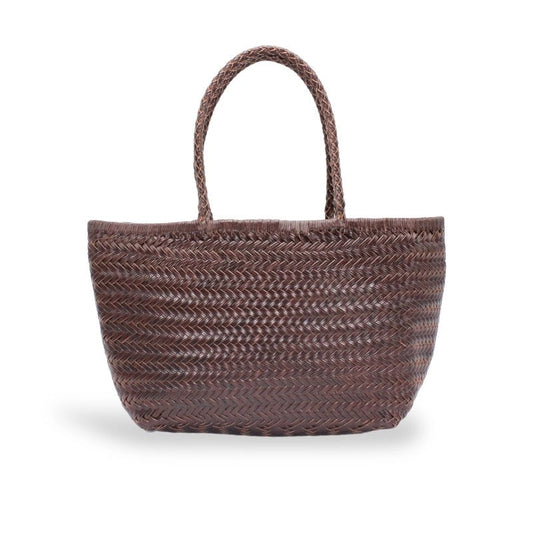 A brown woven straw tote bag with two braided shoulder straps, shown against a plain white background.