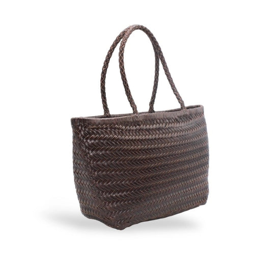 Woven brown handbag on a white background