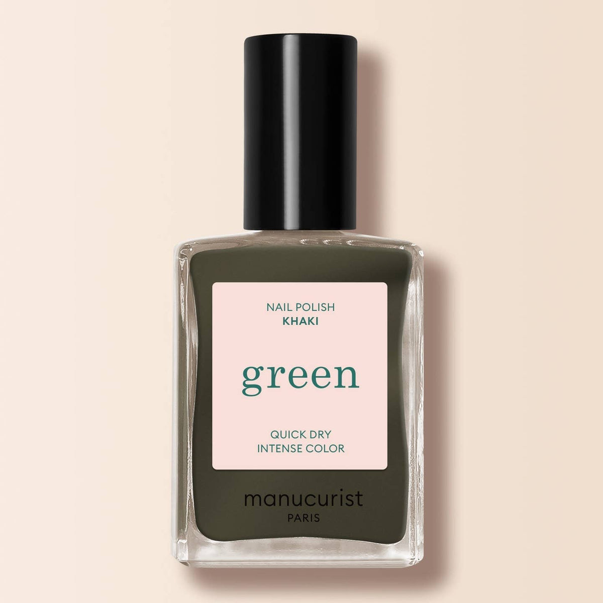 a bottle of khaki nail varnish on a cream background