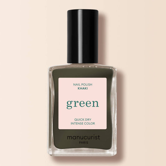 a bottle of khaki nail varnish on a cream background