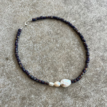 Load image into Gallery viewer, Beaded necklace with pearls on a gray surface
