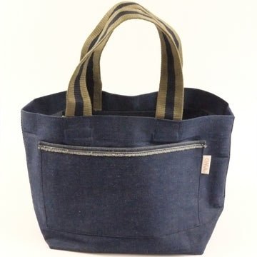 Blue tote bag with striped handles on a white background