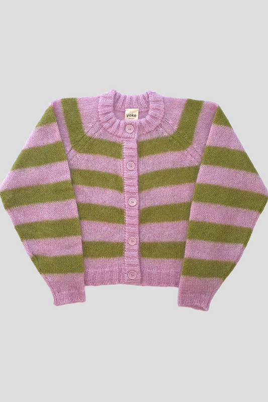 A pink and olive green striped knit cardigan sweater with a ribbed crew neck and button closure, laid flat on a light grey background.