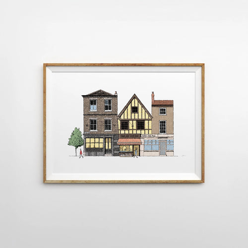 Illustrated print of Tombland in Norwich with some local iconic architecture on a white background. Framed horizontally with a thin light wooden frame on a light grey background