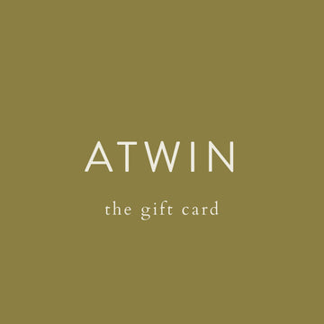 Green background with 'ATWIN' and 'the gift card' text