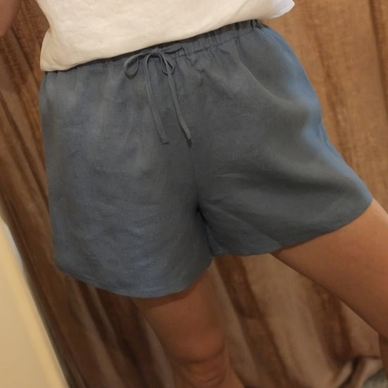 person wearing blue shorts