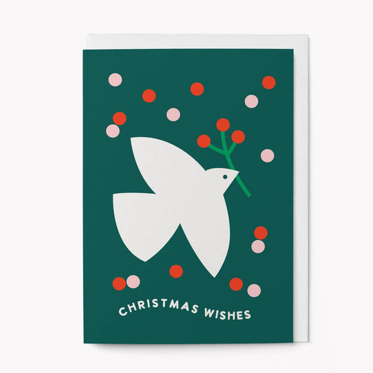 Christmas card with a white dove and colorful dots on a green background
