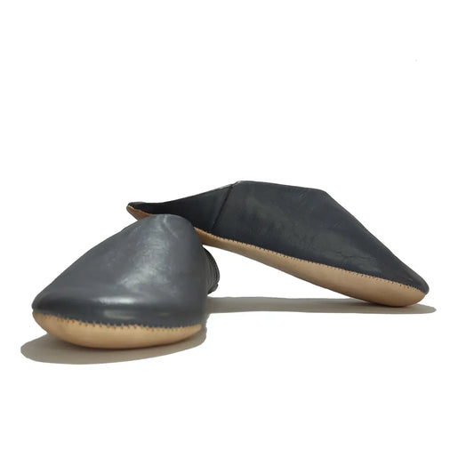 Pair of gray leather shoes on a white background