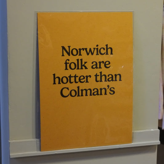 mustard yellow paper with typography print