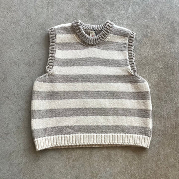 Striped knitted vest on a beige background 